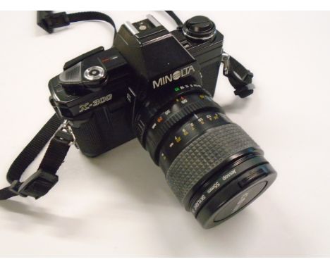 MINOLTA X-300 WITH JESSOP 55MM SKYLIGHT 1A LENS PLUS OTHER ACCESSORIES 