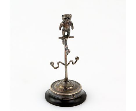 Edward VII silver ring holder, modelled as a miniature coat stand topped with a teddy bear, on wooden base, by Adie &amp; Lov