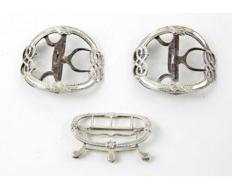 Pair of George III silver buckles with scrolling and foliate decoration, possibly by William Cripps, and another buckle, make