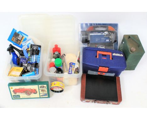 An assortment of car cleaning equipment and a vintage petrol can. The can painted green and marked 'Pratts', together with a 