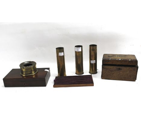 An assortment of collectables. Including three military shell cases, an inkwell, tea caddy, etc