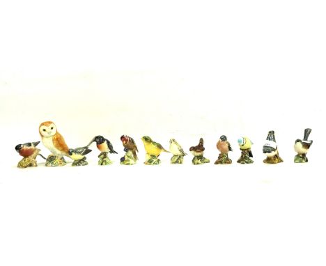 Twelve Beswick ceramic birds. Including 'Nuthatch', 'Wren', 'Goldfinch', etc