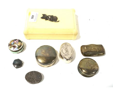 An assortment of silver pots. Including snuff boxes and pill boxes, one circular example with enamel decoration (AF)
