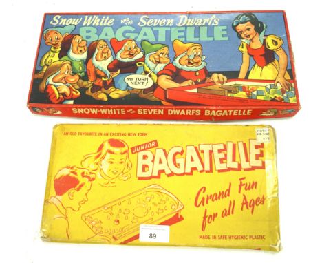 Two vintage bagatelle board games. Comprising a 1930s Chad Valley 'Disney Snow White &amp; The Seven Dwarfs' example, with ba