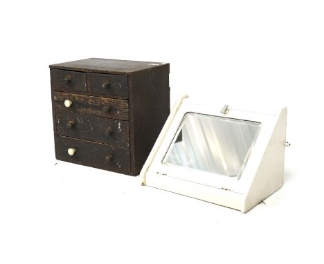 Two small cabinets. Comprising a mid-century white painted corner medicine cabinet and a small chest of five drawers containi