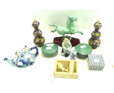 A group of Asian ceramics and collectables. Including a pair of enamel vases and covers, teapot, soapstone brush holder, etc.