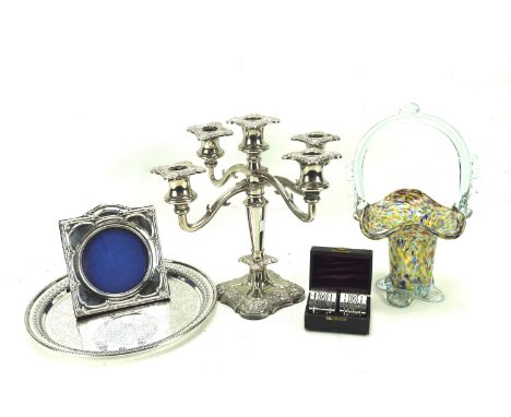 A silver photo frame maker Boots Pure Drug Company, Birmingham 1907, plated tray and candlestick holder, etc. Condition Repor