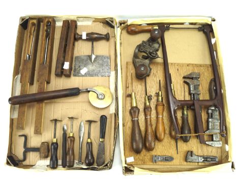 An assortment of tools. Including a Sargent &amp; Co router plane, sack dragger, chisels, etc