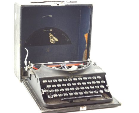 A portable 1920s typewriter. In the original carry case with lock, L31cm