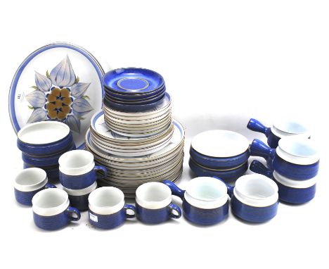 A Denby Chatsworth part dinner service. Decorated with flowers and a blue and white glaze, including plates, platters, bowls,