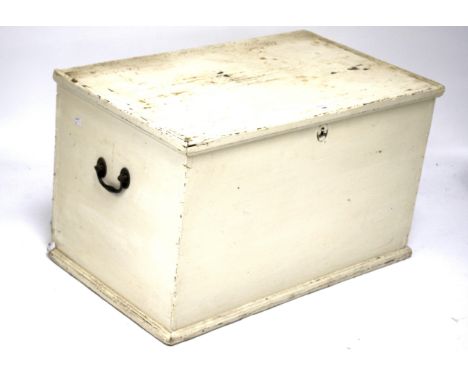 A 19th century white painted pine storage trunk. Of rectangular form, twin handled, L79cm x D47cm x H46cm