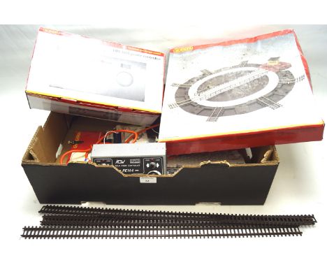 An assortment of OO gauge track and accessories. Including a boxed Hornby 'Track Pack' 8017, Lima 'Track Pack' TX 4680, AGW E