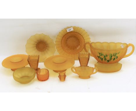 A collection of 1930s amber glassware. Including vases, dishes, a candlestick, etc