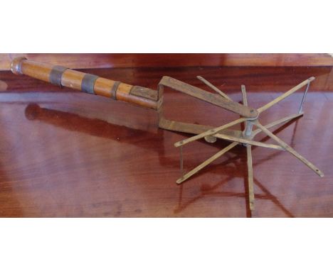 Fishing - an early 20th century brass, steel and oak liner dryer/winder, 64cm long**Please note all lots must be collected fr