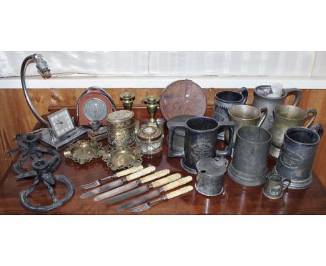 A pair of brass boudoir candlesticks;  a pair of novelty horseshoe chambersticks; a novelty barometer,  mounted in a stirrup;