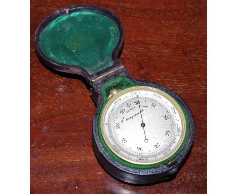 A 19th lacquered brass combination barometer and thermometer, the double-sided drum enclosing both scientific instruments, 4.