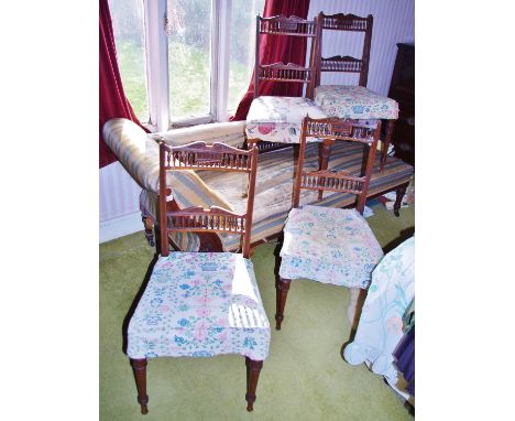 A set of four  late Victorian mahogany side chairs, turned and fluted legs, spindle galleries, c.1890(the chaise longue in th