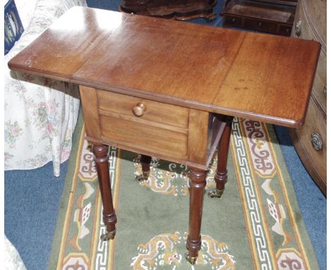 Gillow & Co - an early Victorian mahogany bedroom table, rounded rectangular top with fall leaves, above a fall-front, turned