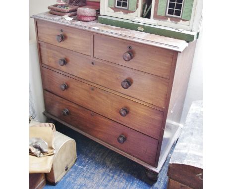An early Victorian mahogany chest, oversailing top above two short and three long graduated drawers, turned handles and feet,