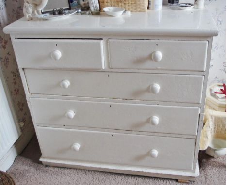 A Victorian pine chest of two short and three long graduated drawers, turned handles, skirted base, 108cm high, 115cm wide, 5