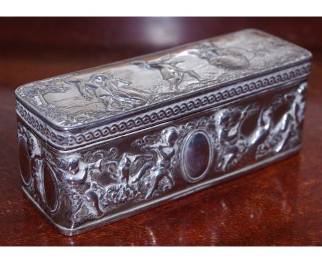 An early 20th century silver rounded rectangular snuff box, hinged cover embossed with figures of the court playing blind man