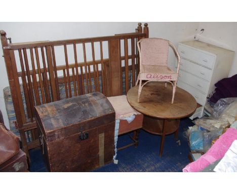 An early 20th century domed top pine trunk;  a mid 20th century child's cot;  an occasional table;  white painted chest;  chi