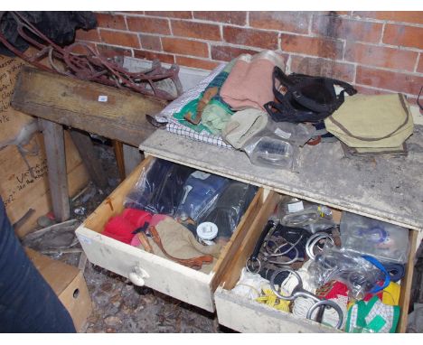 A wooden saddle horse and two wall mounted saddle racks;  two show jump wings;  bits, stirrups;   etc**Please note all lots m