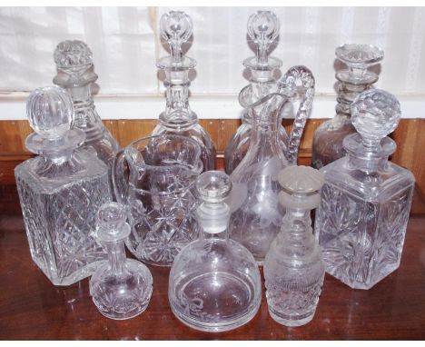 A pair of clear glass decanters, globular stopper;  others, various designs;   etc**Please note all lots must be collected fr