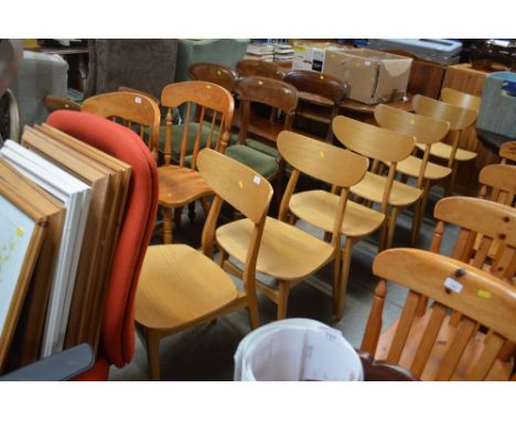 A set of six light oak veneered chairs 