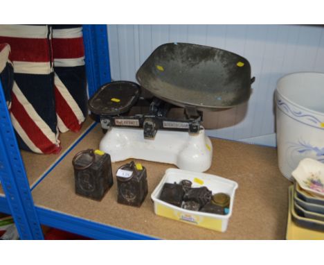 A set of kitchen scales and weights
