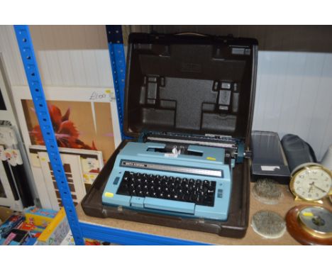 A Smith Corona portable typewriter in carrying case