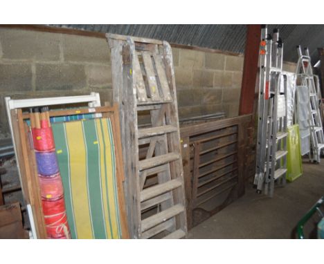 Two wooden step ladders
