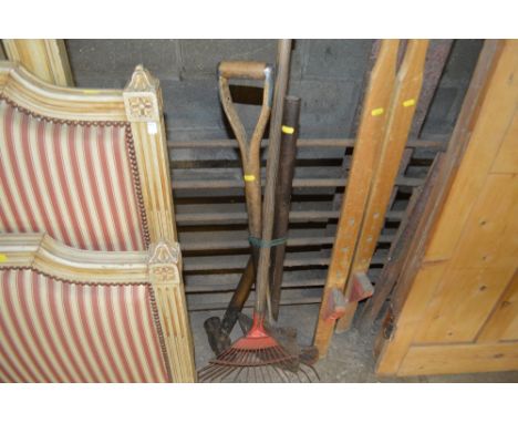 A bundle of gardening tools