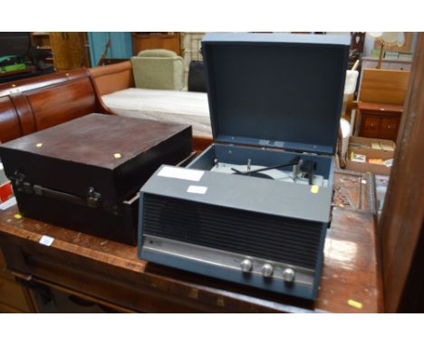 An Ekco record player sold as collector's item; together with a quantity of records
