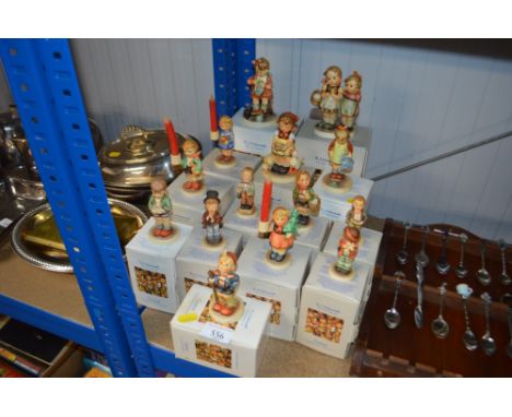 A quantity of boxed Goebel figures