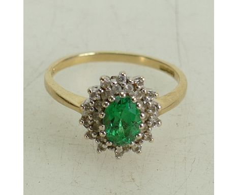 14k gold ring set with CZ white stones & synthetic green emerald stone:  14K ring 3.4g gross, size Q: 