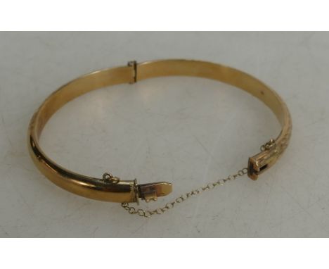 9ct gold bangle:, 8.3 grams.