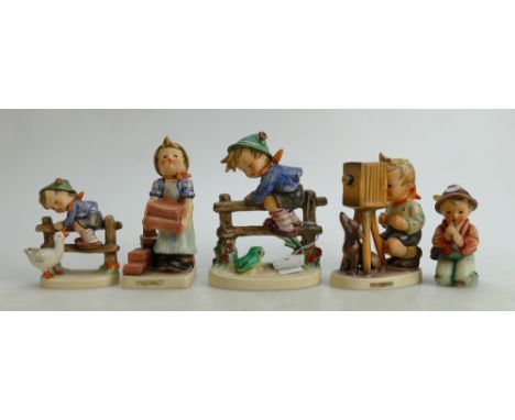 Goebel figures to include: Boy On Fence, Boy with Goose, Little Tooter, The builder &amp; The Photographer(5)
