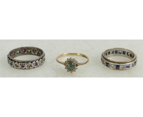 9ct gold rings:comprising 9ct gold eternity ring set with blue stones, size L/M, 9ct &amp; silver eternity ring size N and 9c