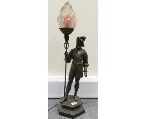 Vintage spelter lamp figure of a musketeer, spelter figure of a standing musketeer holding a lamp, overall height 73cm.