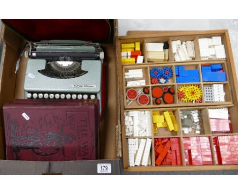 A mixed collection of items to include: Early Lego items, Empire Corona Typewriter, hard back books etc (2 trays)