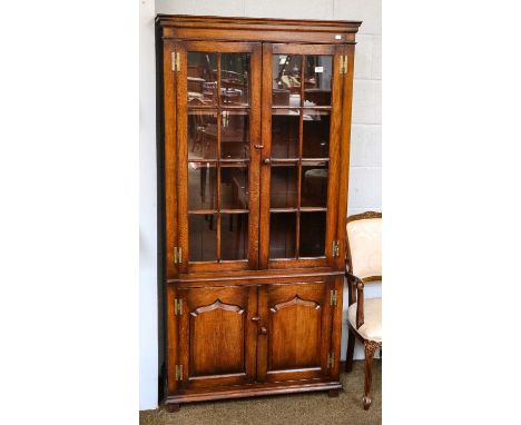 A solid oak Titchmarsh &amp; Goodwin style bookcase, 90cm by 40cm by 183cm