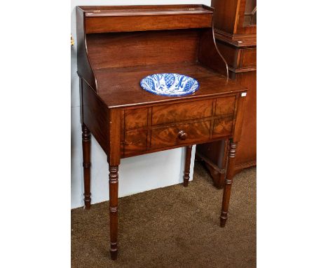 A Victorian mahogany washstand with ebony stringing and ring turn supports, 69cm by 48cm by 110cm