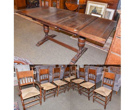 A 20th century oak draw-leaf extending dining table, on bulbous legs joined by an H stretcher; and a set of six 20th century 