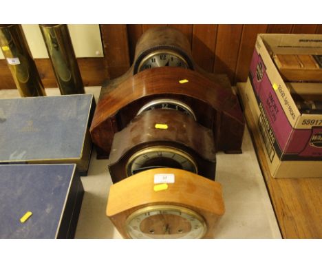 Four various wooden cased mantel clocks 