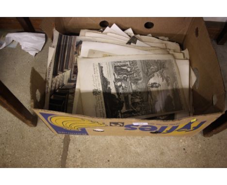 A box of assorted prints 