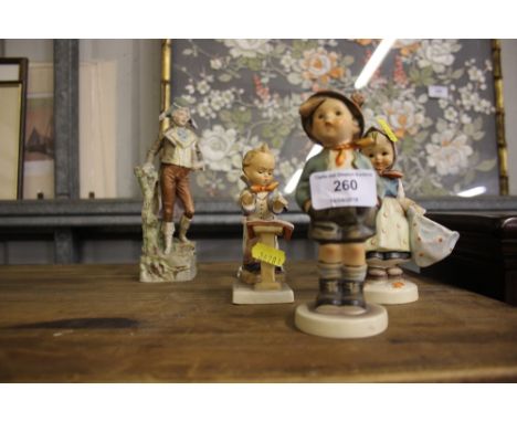 Three various Goebel figures; and three continental figures 