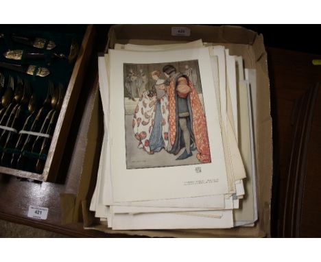 A tray of unframed prints