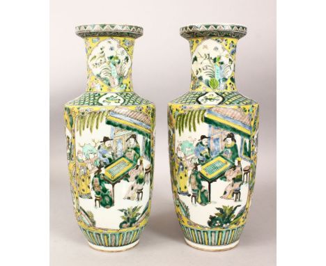 A PAIR OF 19TH CENTURY CHINESE ROULEAU FAMILLE VERTE PORCELAIN VASES, the body of the vases with panels depicting scenes of i