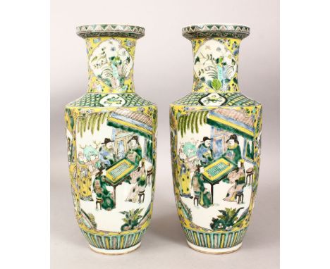 A PAIR OF 19TH CENTURY CHINESE ROULEAU FAMILLE VERTE PORCELAIN VASES, the body of the vases with panels depicting scenes of i